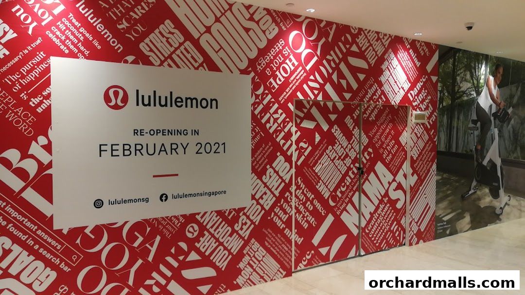 Lululemon store re-opening announcement with motivational quotes on the wall.