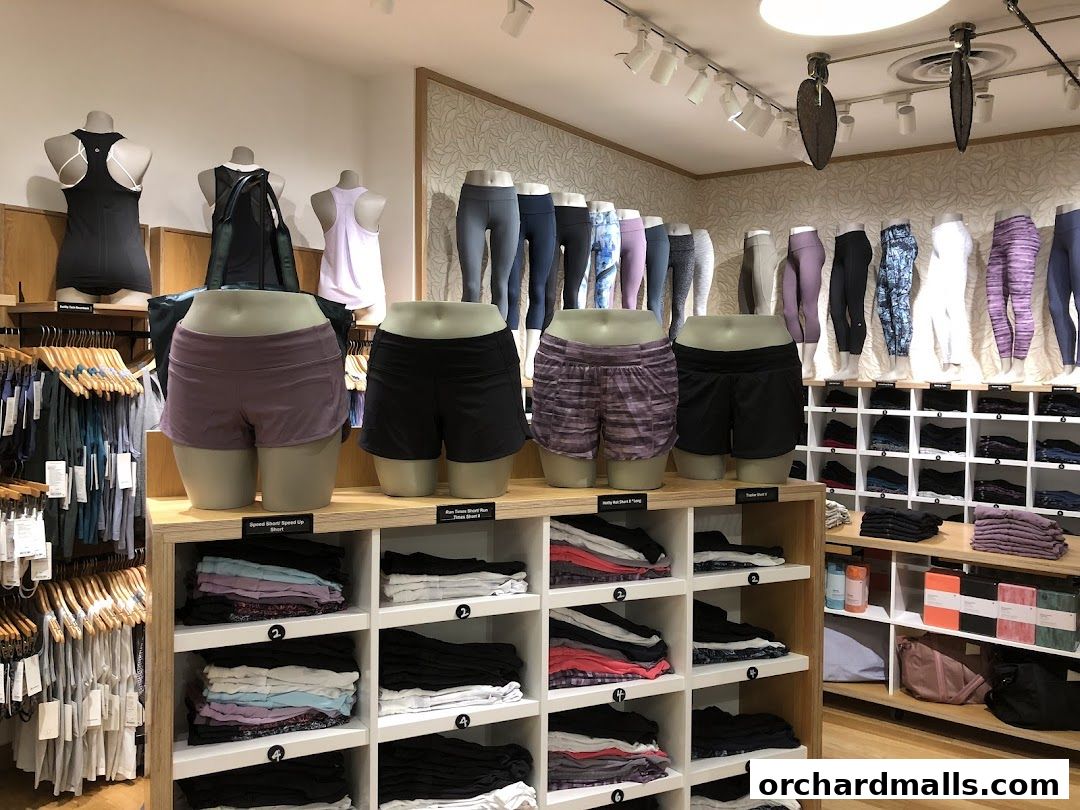 Lululemon store interior showcasing athletic apparel on mannequins and shelves.