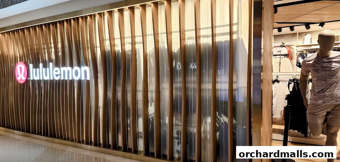 The lululemon store features a modern facade with wooden slats and a prominent illuminated logo.