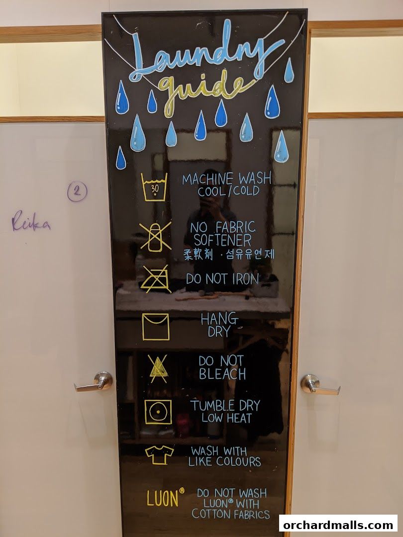 A laundry guide sign with washing instructions and symbols.