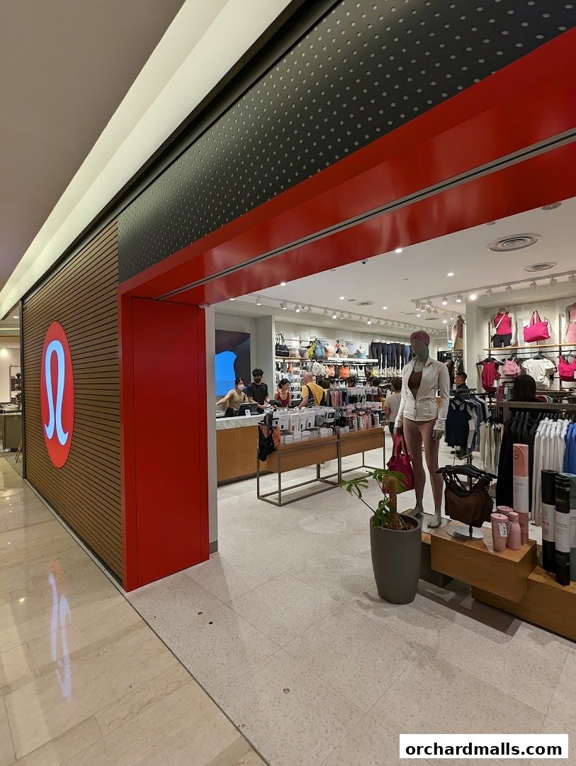 The entrance to a Lululemon store showcasing activewear and accessories.