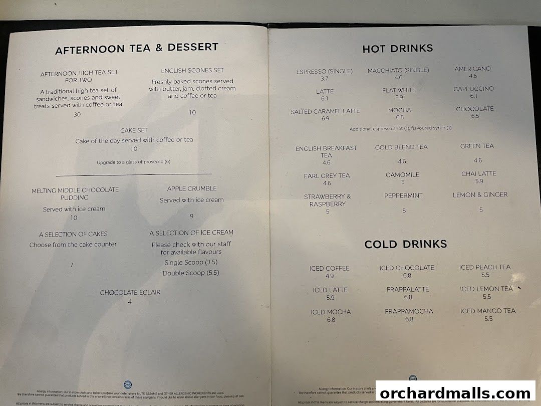 A menu from MS Café featuring afternoon tea, desserts, hot drinks, and cold drinks.