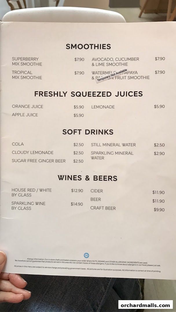 A menu from MS Café featuring smoothies, juices, soft drinks, and wines & beers.