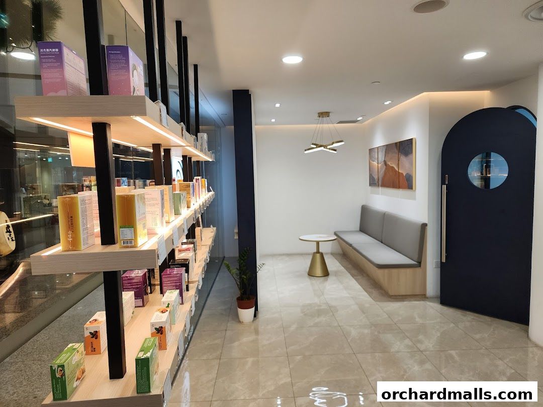 Interior of a modern TCM shop with shelves of products and a waiting area.