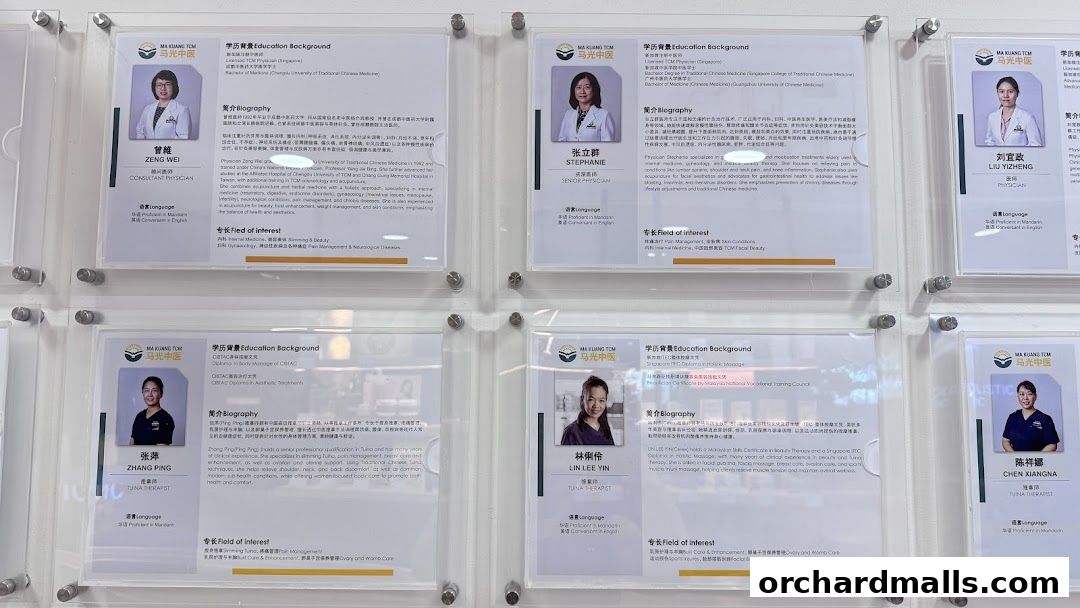 Display of physician profiles and their educational backgrounds at Ma Kuang TCM.