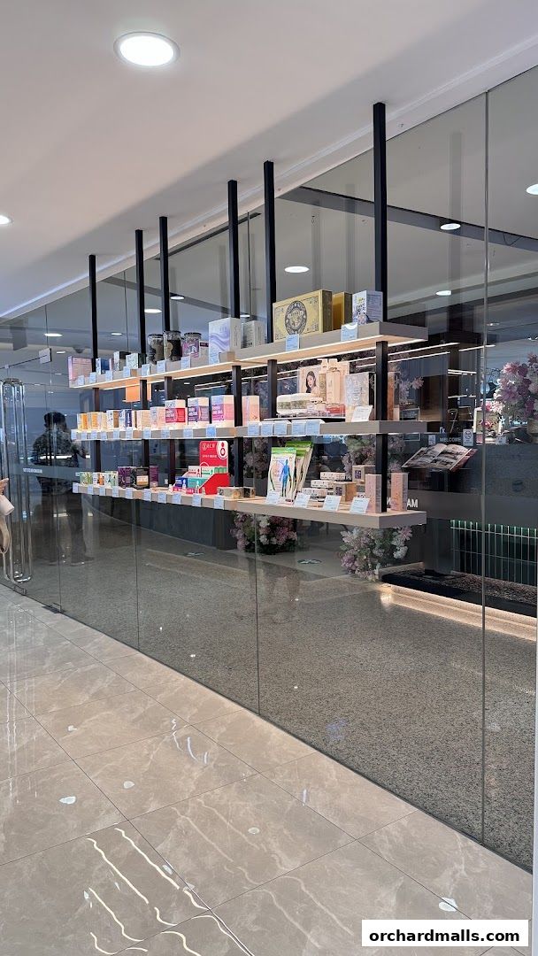 Shelves stocked with various health and wellness products in a modern retail store.