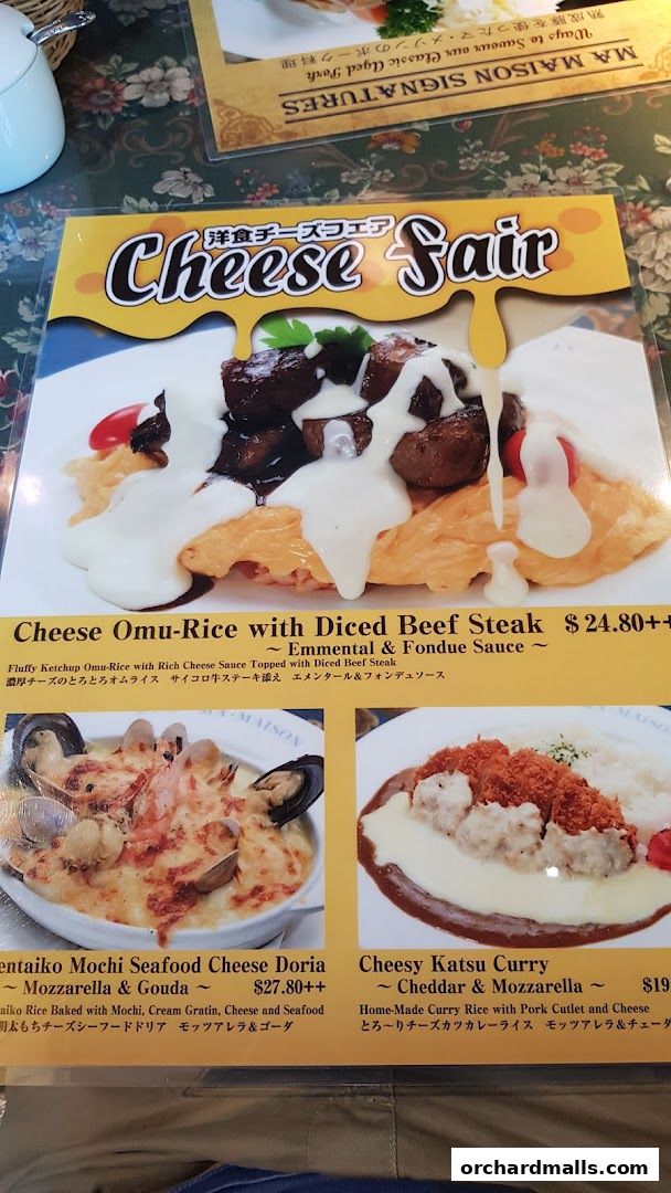 A menu featuring various cheese-infused dishes like Omu-Rice, Seafood Doria, and Katsu Curry.