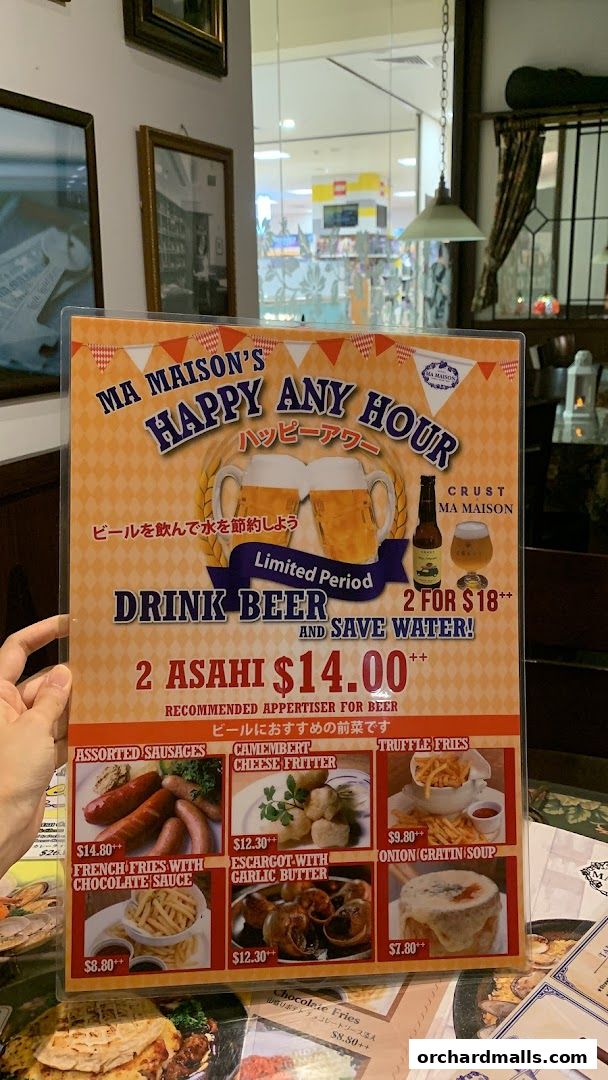 A menu for Ma Maison's Happy Hour featuring beer and appetizer specials.