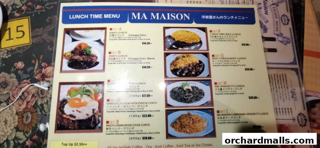 A lunch menu from Ma Maison restaurant featuring various set meals with images.