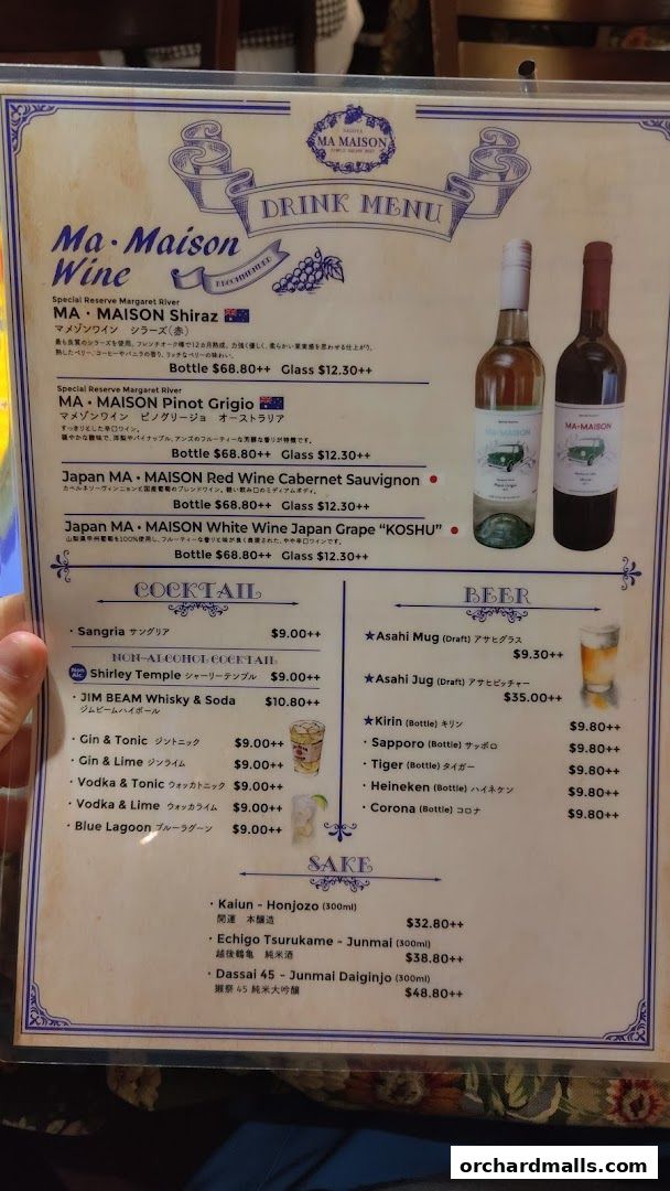 A drink menu from Ma Maison featuring wines, cocktails, beers, and sake.