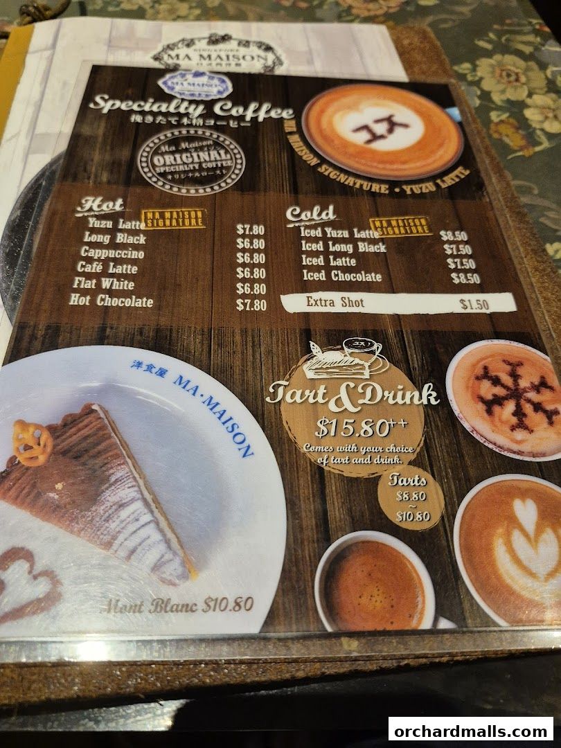 A menu from Ma Maison featuring specialty coffees, tarts, and drinks.