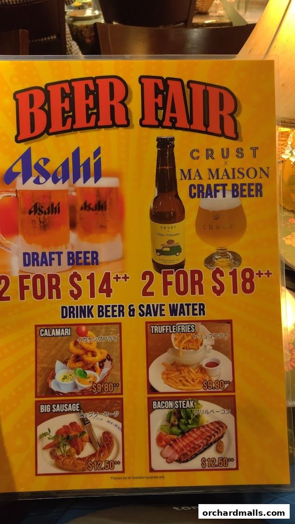 A menu board advertising a beer fair with food pairings like calamari, truffle fries, big sausage, and bacon steak.