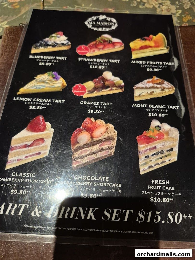 A menu showcasing various tarts and cakes from Ma Maison, with prices listed.
