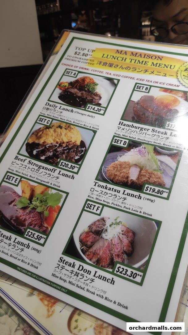A menu from Ma Maison restaurant featuring various lunch sets with pictures and prices.