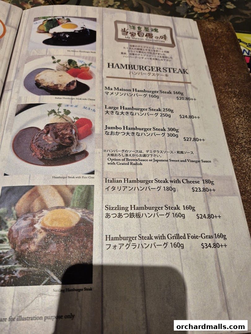 A menu page from Ma Maison featuring various hamburger steak dishes with prices.