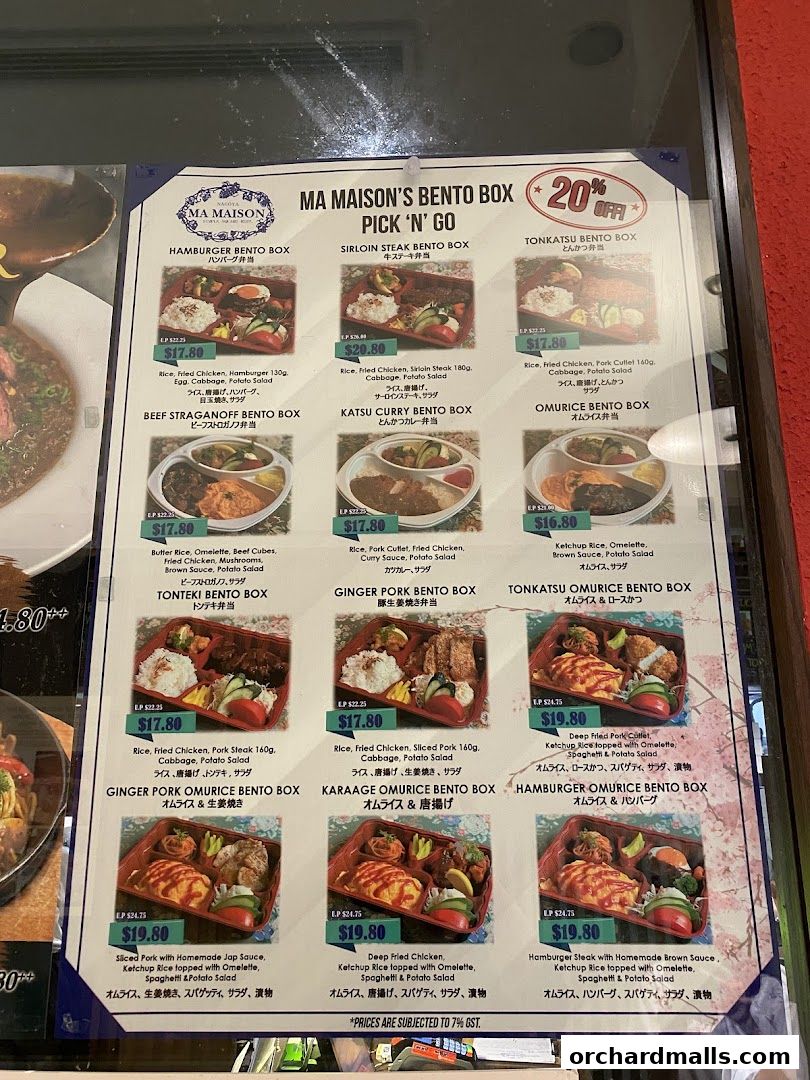 A menu board displaying various bento box options from Ma Maison with prices and images.