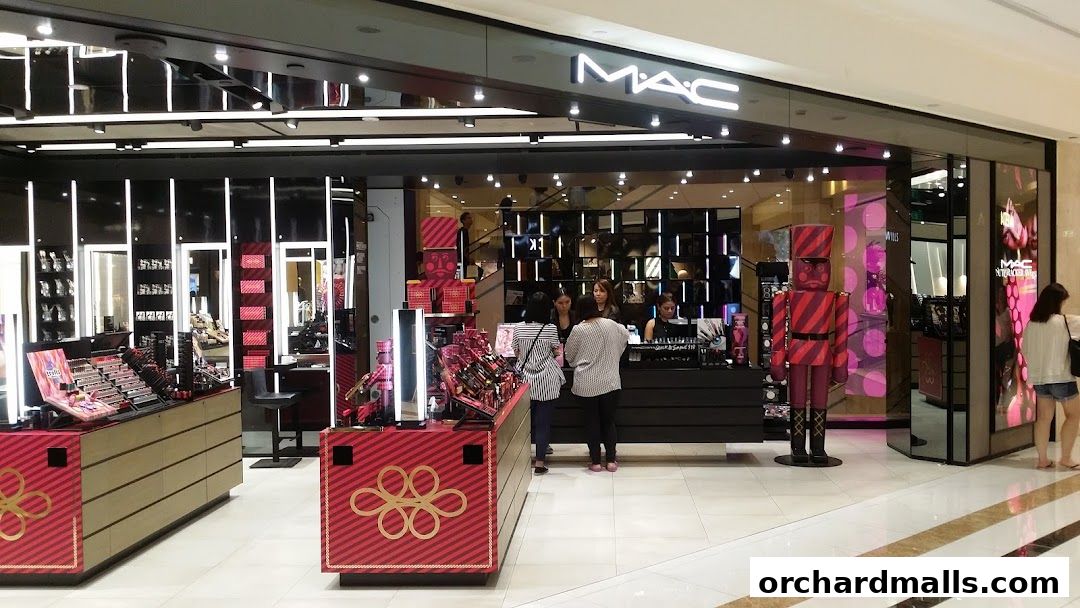 MAC Cosmetics store entrance with makeup displays and festive nutcracker decorations.
