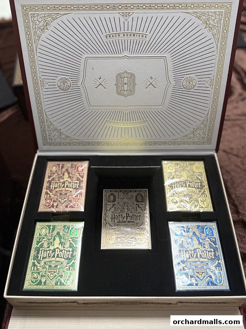 A set of Harry Potter themed playing cards in a decorative box.