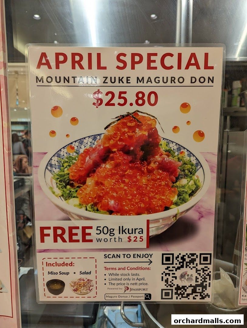 A sign advertising an April special of Mountain Zuke Maguro Don for $25.80 with free Ikura.