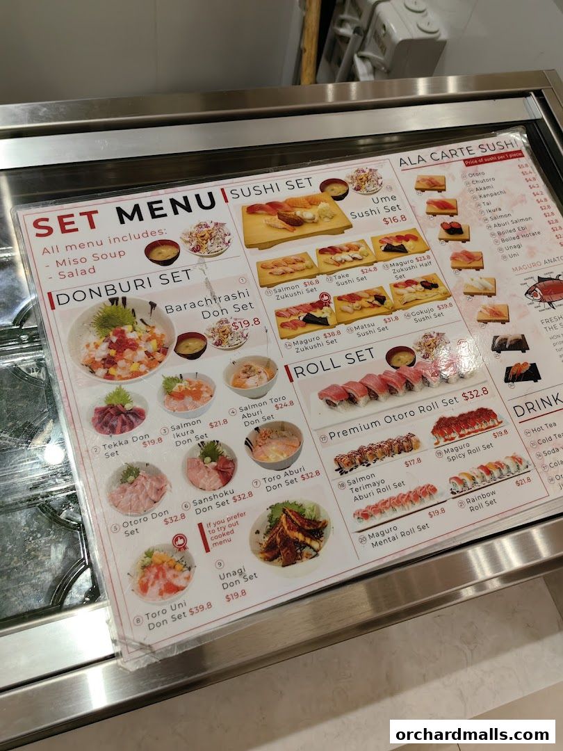 A menu for Maguro Yukimitsu featuring sushi sets, donburi bowls, and roll sets.