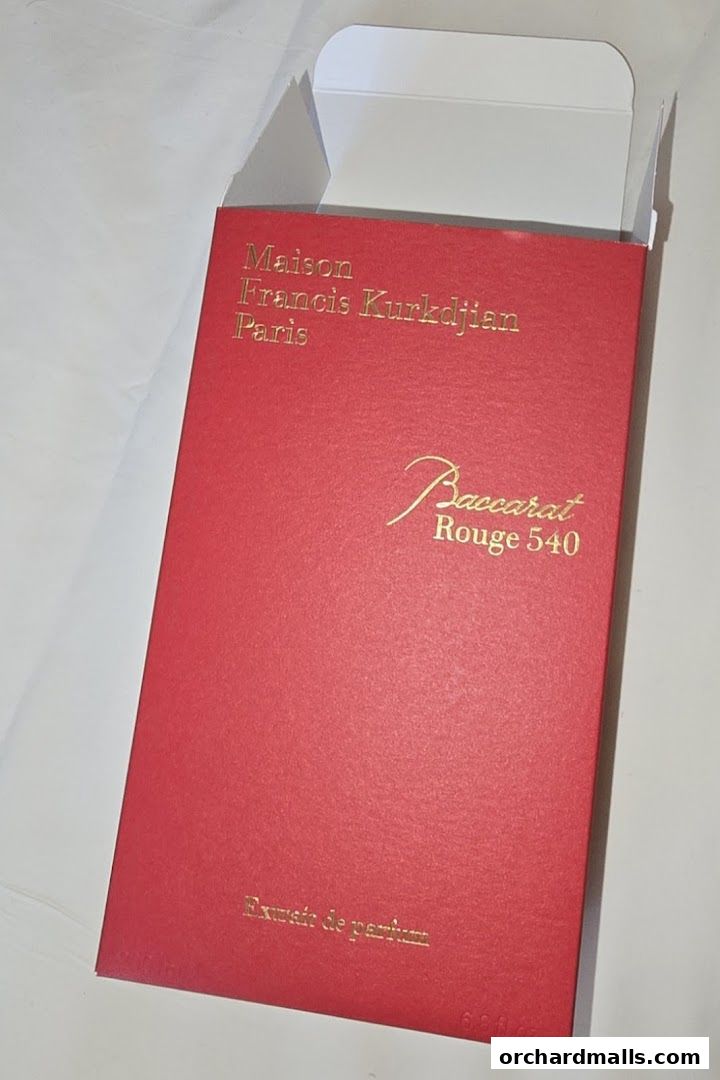 A red box with gold lettering for Maison Francis Kurkdjian Baccarat Rouge 540.
