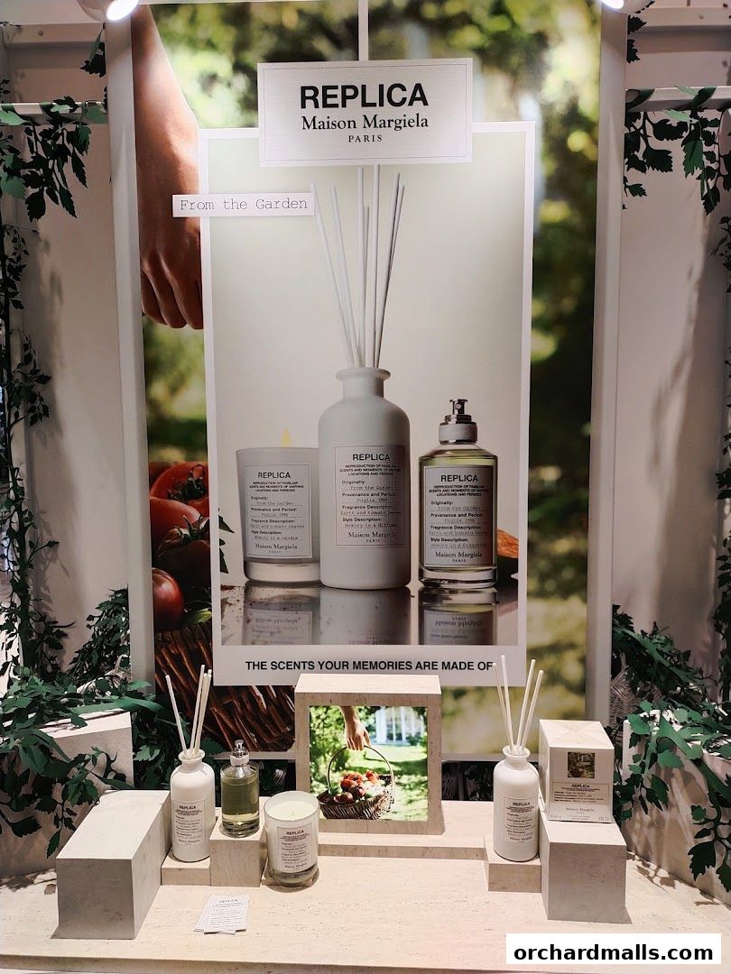 Maison Margiela Replica display featuring 'From the Garden' scents.