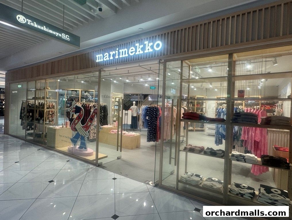 Marimekko store interior showcasing colorful apparel and home goods on display.