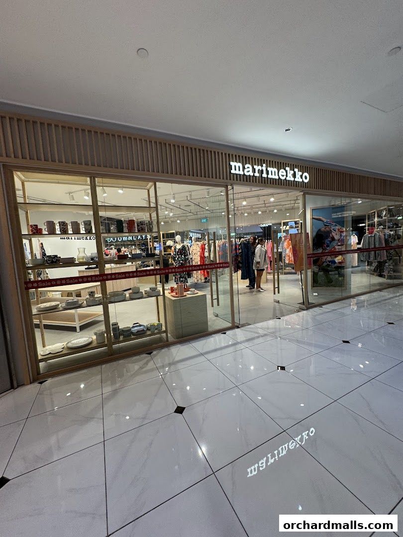 Marimekko store entrance showcasing home goods and apparel with bright lighting.