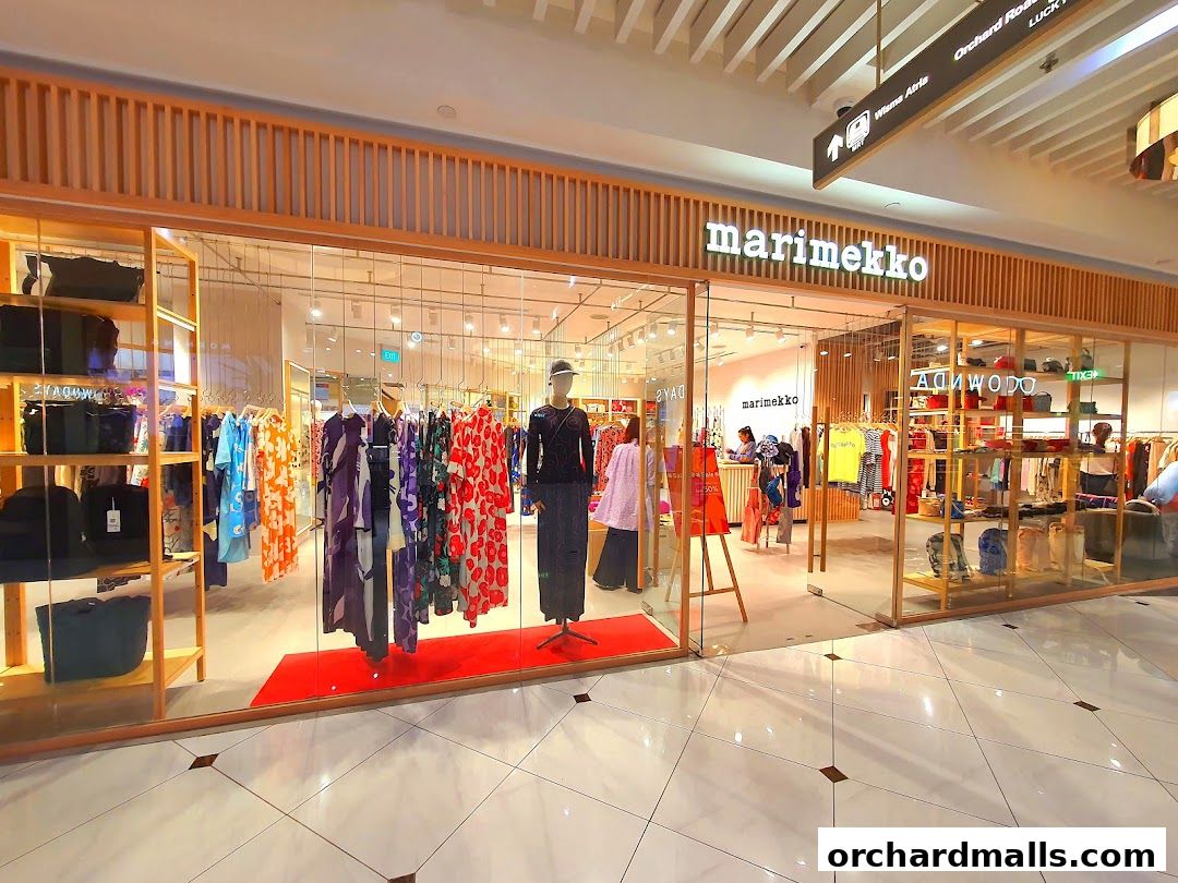 Marimekko store interior showcasing colorful apparel and accessories on display.