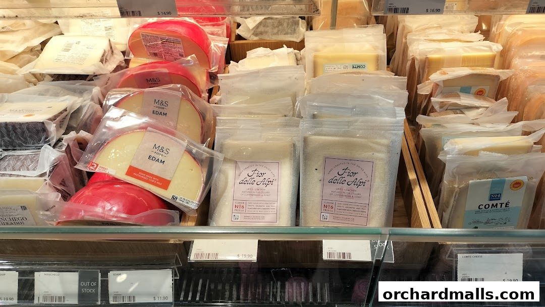 A display of various cheeses, including Edam and Comte, at Marks & Spencer.