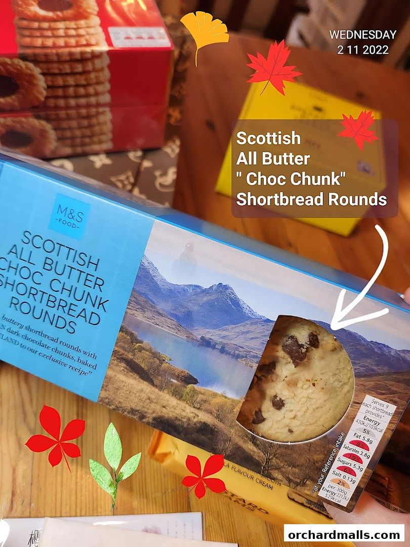 A box of M&S Scottish All Butter Choc Chunk Shortbread Rounds with a scenic landscape.