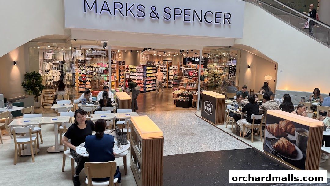 Marks & Spencer shop with a cafe area and customers dining.