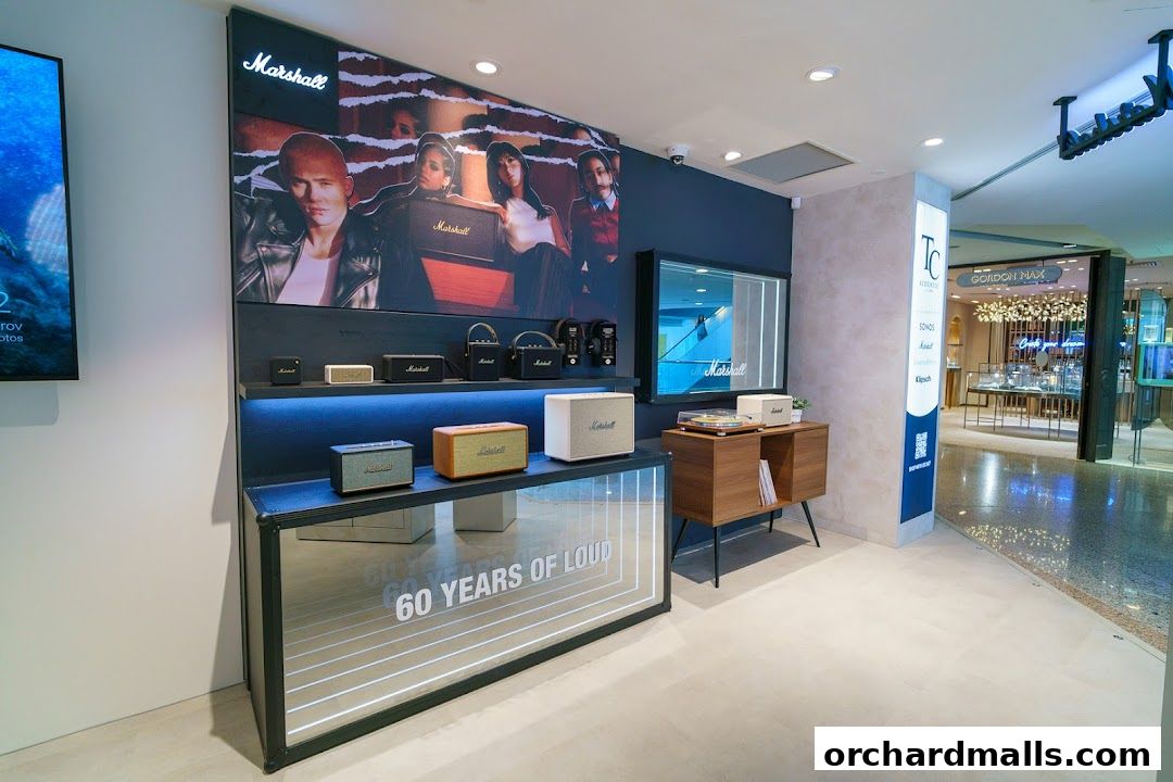 Marshall store interior showcasing speakers and audio equipment with a large promotional banner.