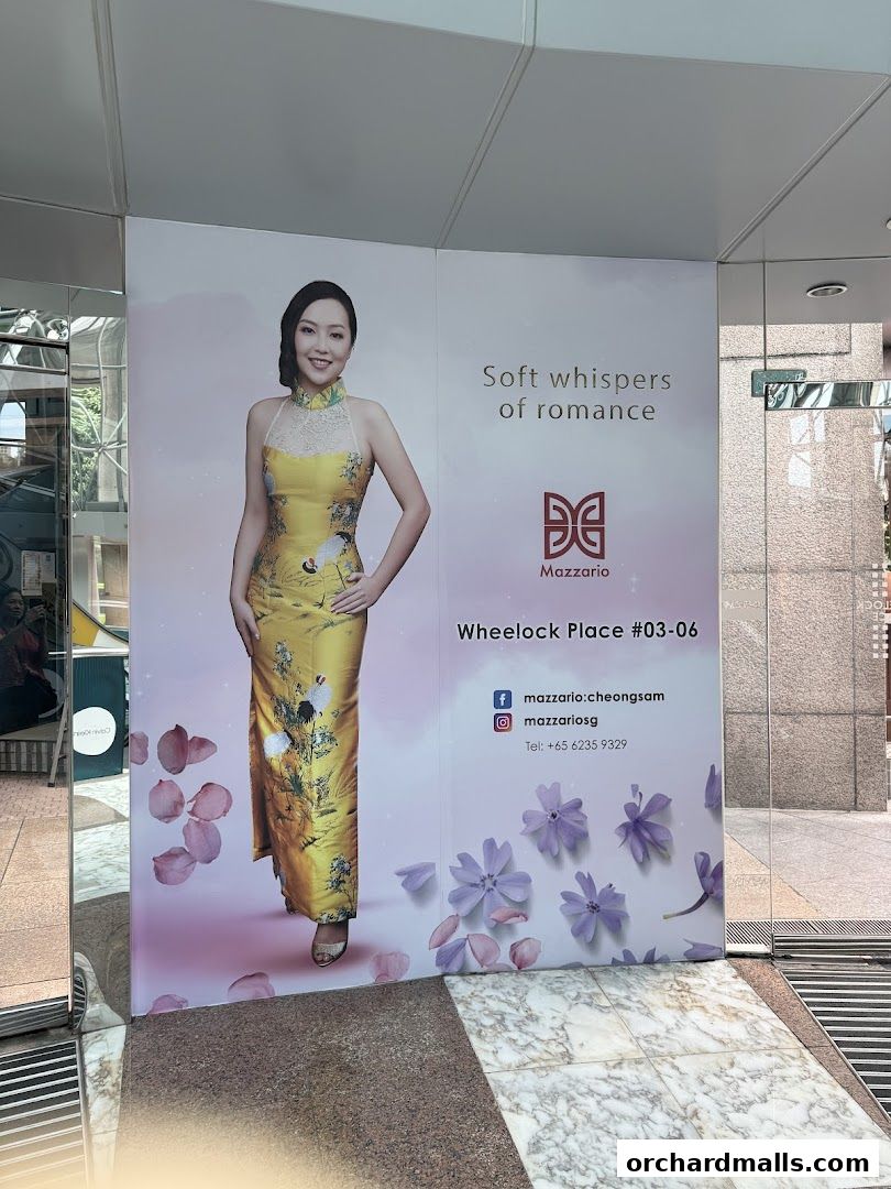 A woman in a yellow dress is featured on a shop advertisement with floral accents.