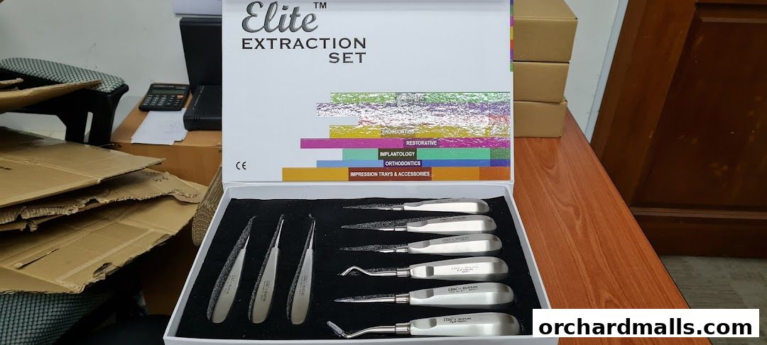 An Elite Extraction Set dental instrument kit is displayed in its packaging.