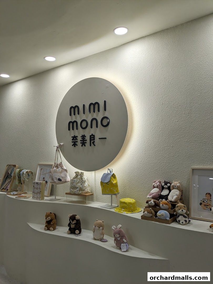 A display of cute plush toys, bags, and accessories at Mimi Mono.