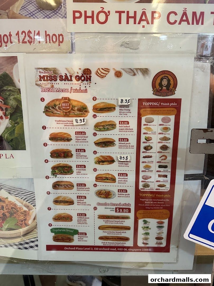 A menu for Miss Saigon Singapore featuring various Banh Mi options and toppings.