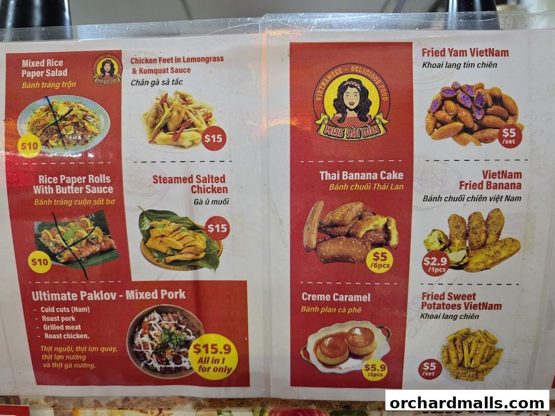 A menu from Miss Saigon Singapore featuring Vietnamese dishes like rice paper salad and fried bananas.