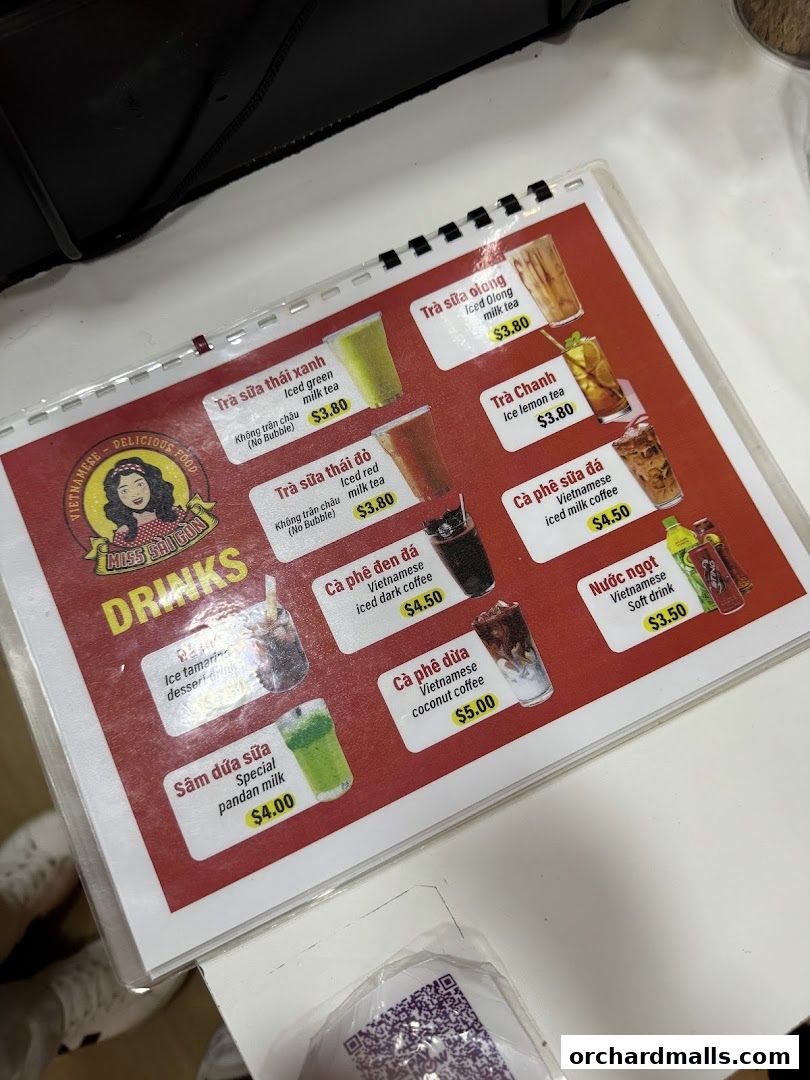 A menu from Miss Saigon Singapore featuring various Vietnamese drinks with prices.