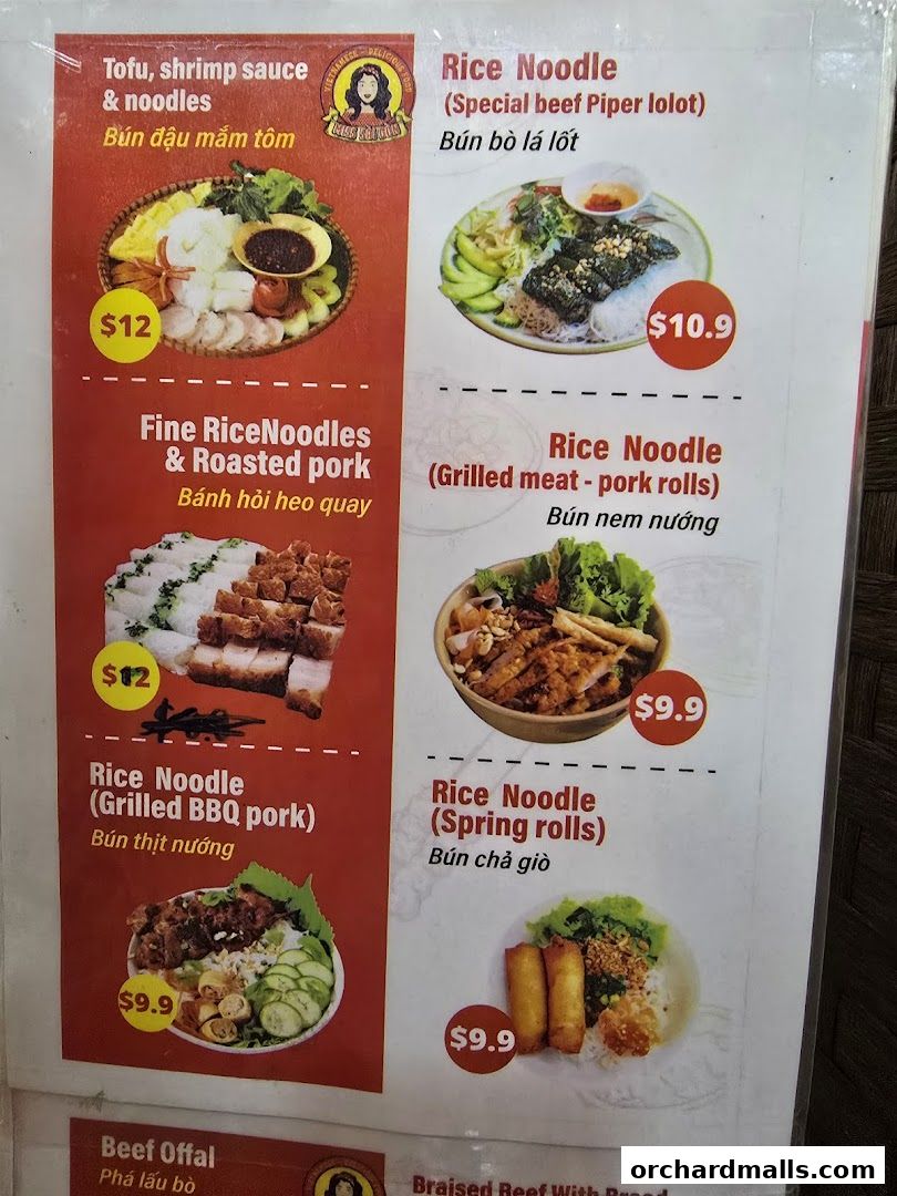 A menu from Miss Saigon Singapore featuring various Vietnamese noodle dishes with prices.
