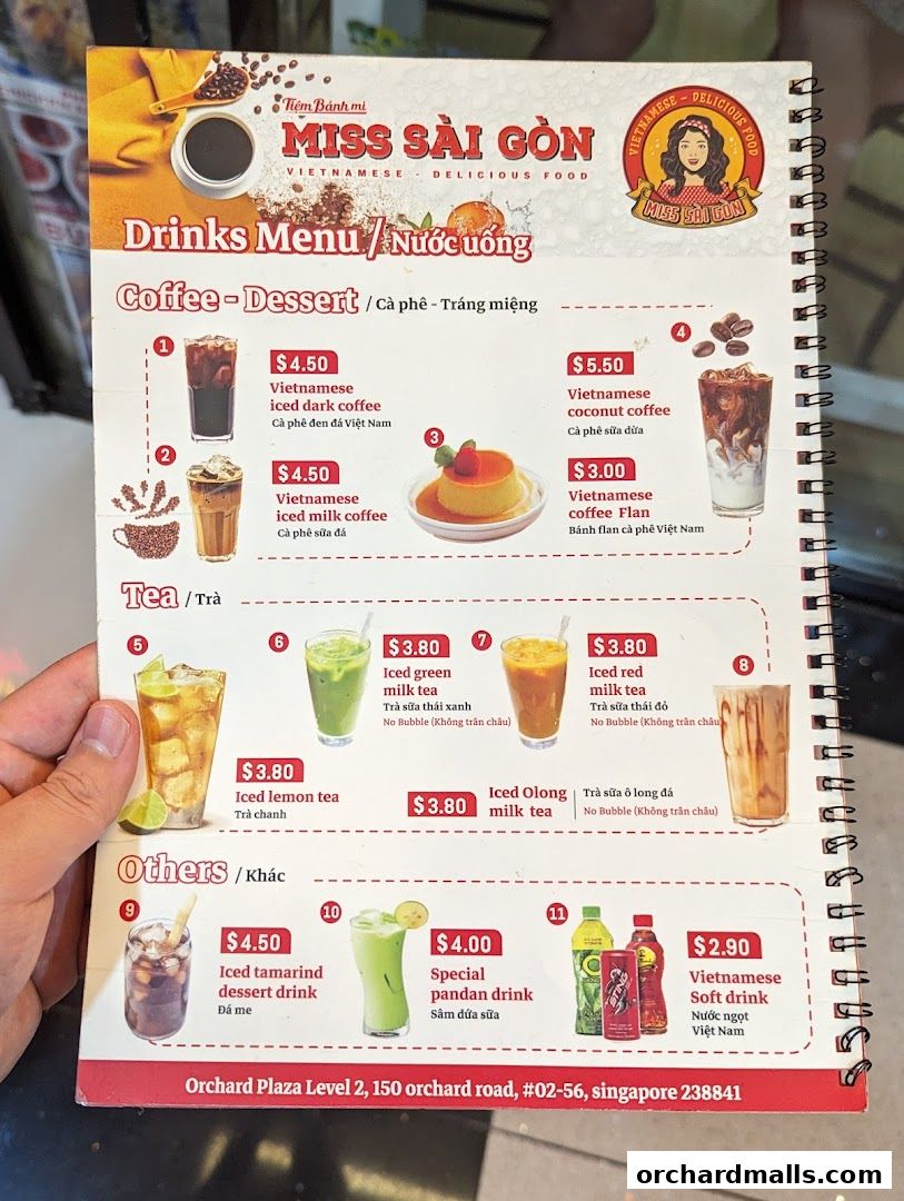 A menu from Miss Saigon Singapore featuring Vietnamese drinks and desserts.