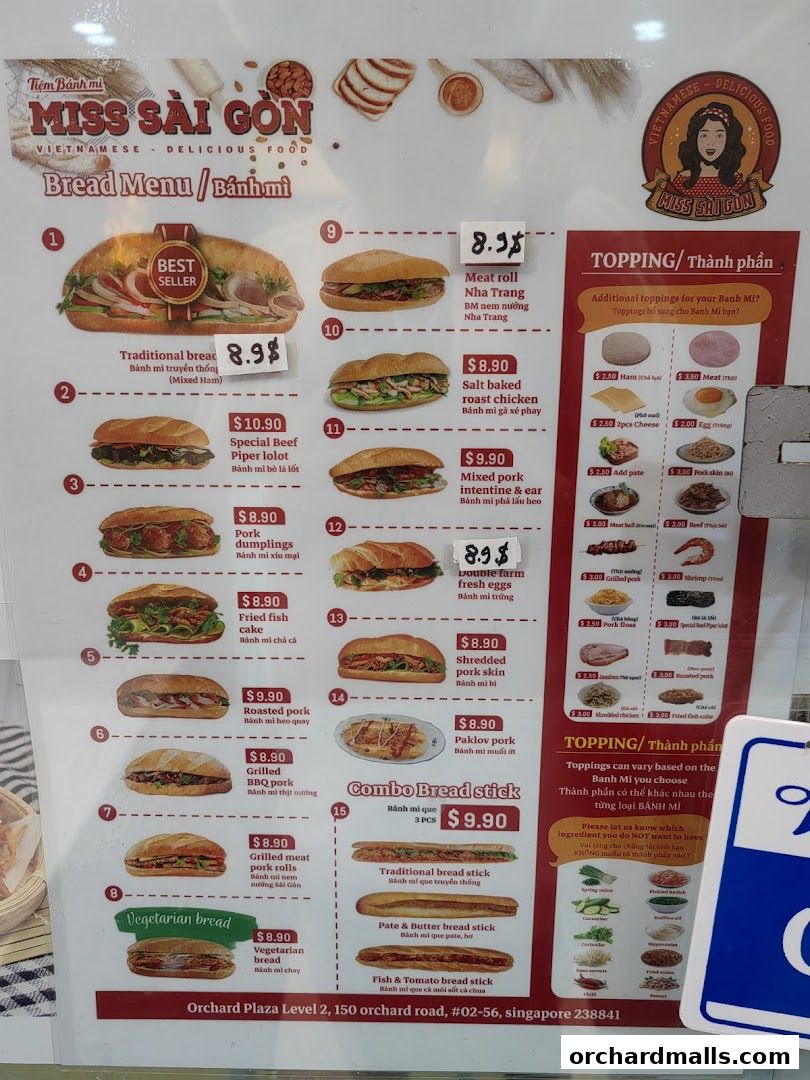 A menu for Miss Saigon Singapore featuring various Banh Mi options and toppings.