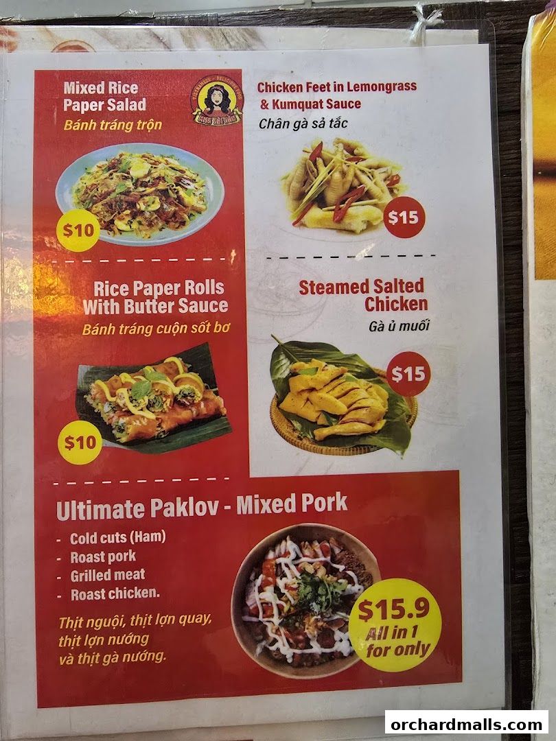 A menu from Miss Saigon Singapore featuring Vietnamese dishes like rice paper salad and chicken feet.