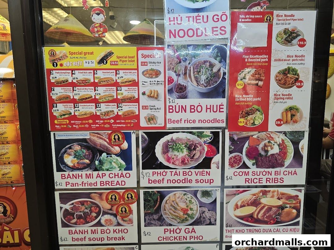A display of Vietnamese food menu items with pictures and prices.