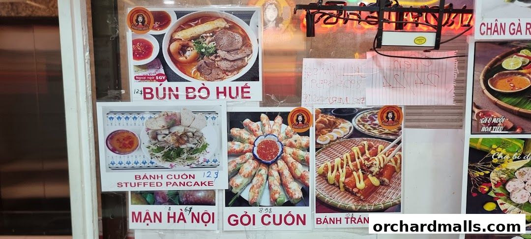A display of Vietnamese dishes including Bún Bò Huế, Bánh Cuốn, and Gỏi Cuốn.