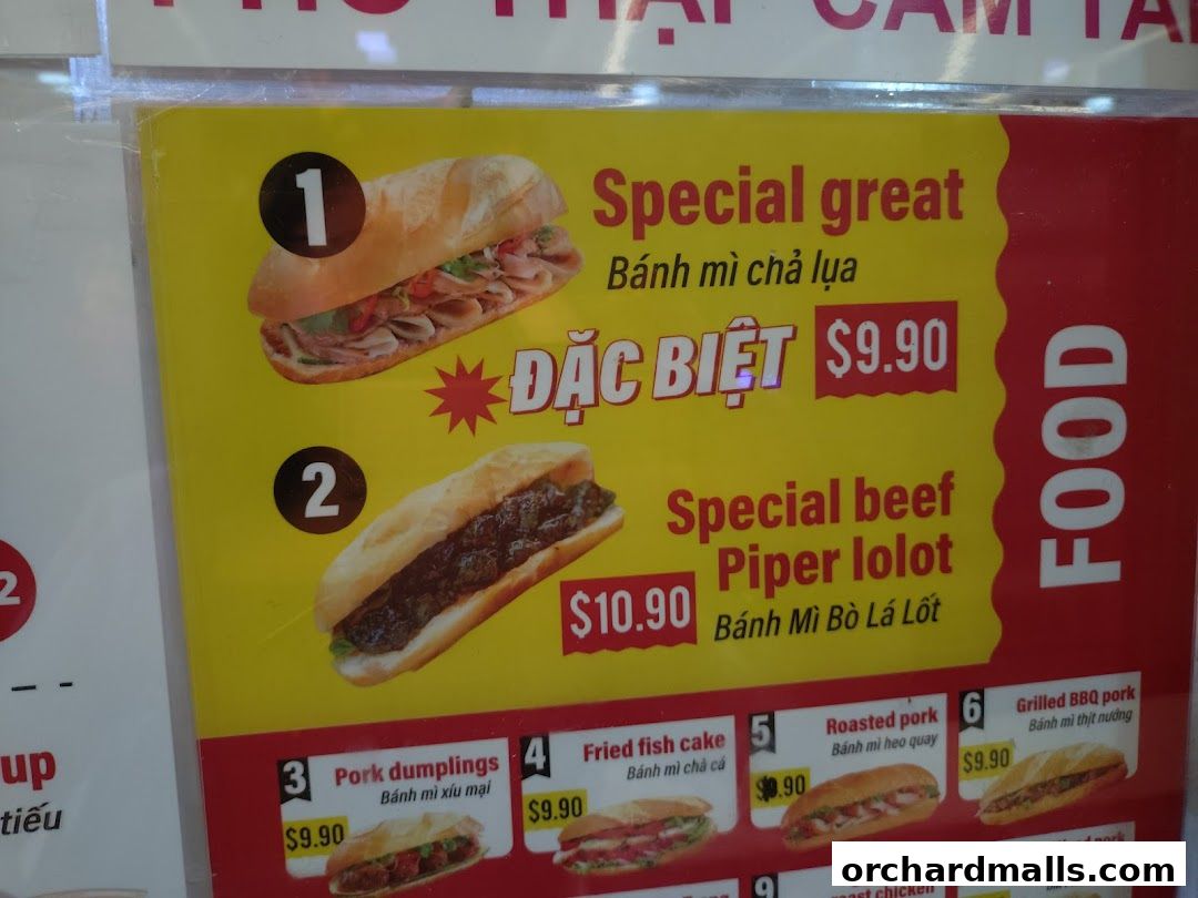 A menu board displaying various Vietnamese banh mi sandwiches with prices.