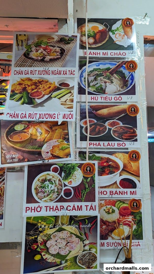 A display of Vietnamese food menu items with prices and images.
