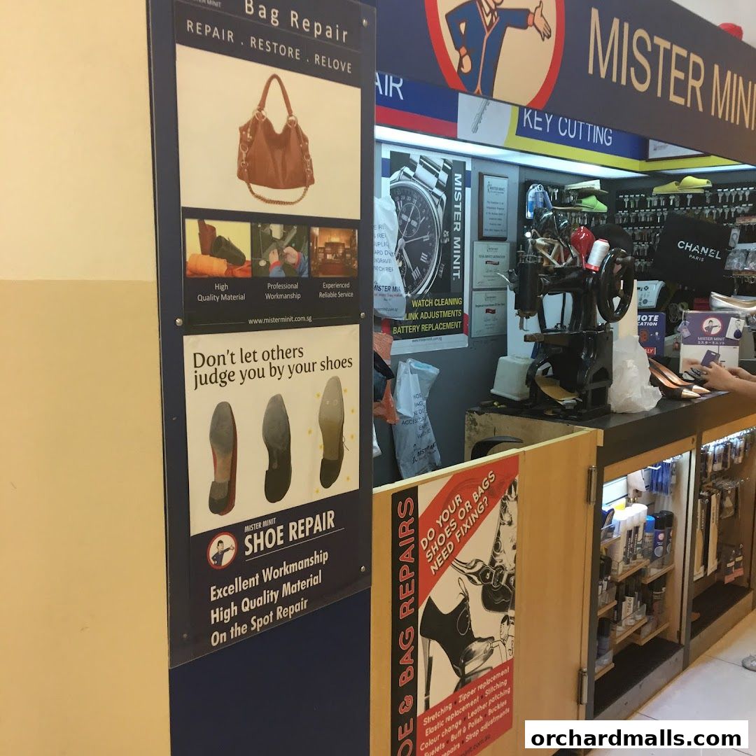 Mister Minit Ngee Ann City shop front displaying bag and shoe repair services.