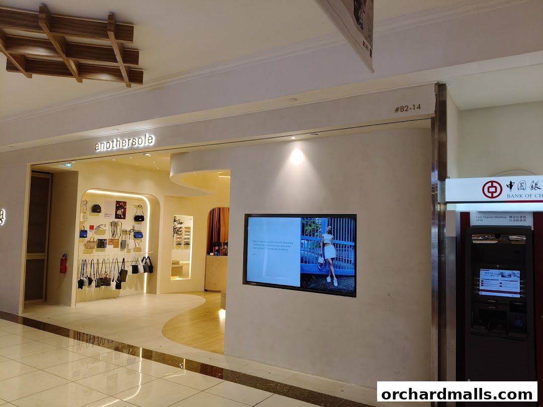 The entrance of the 'anothersole' shop displaying handbags and accessories.