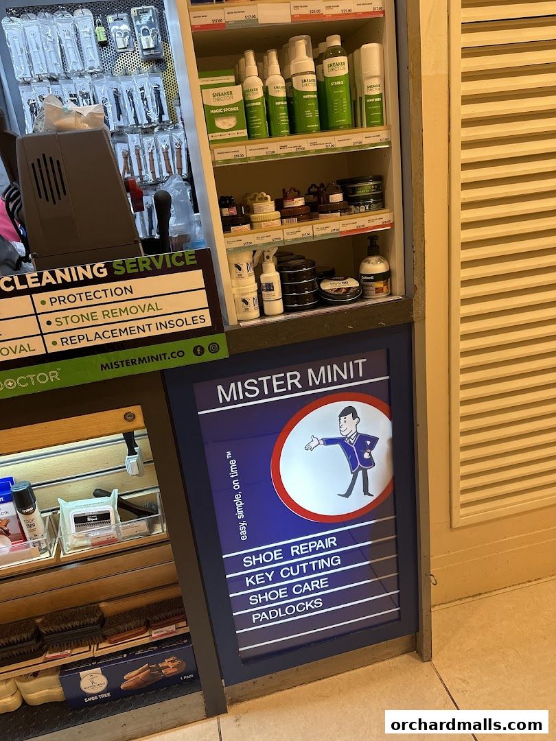 Mister Minit Ngee Ann City shop front displaying shoe care products and services.